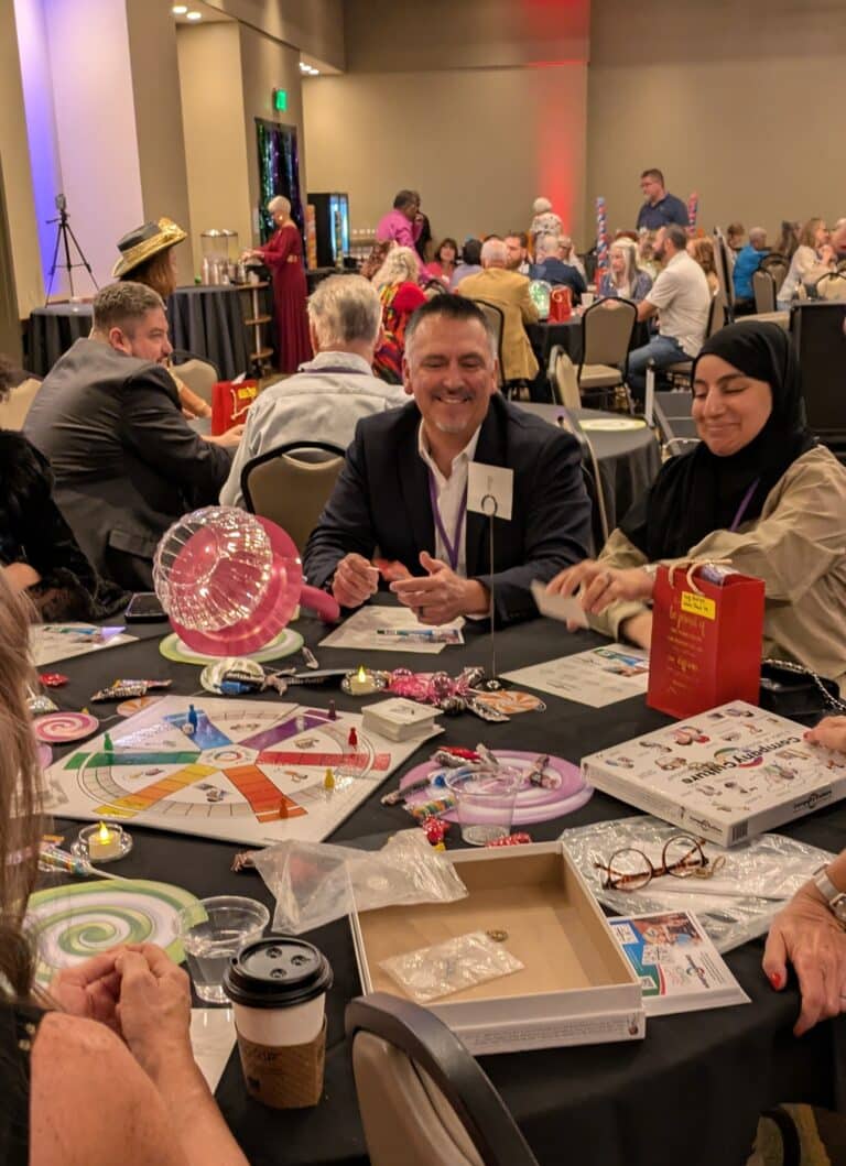 Group playing the game. Smiling and enjoying the experience.